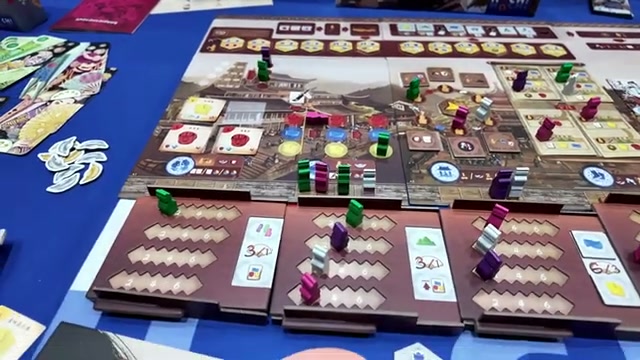 Spielplan und Spielfiguren von Jiangnan